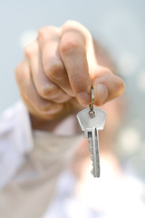 hand holds a key