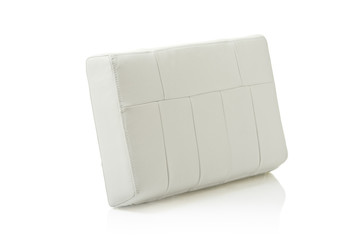 White leather pillow isolated against white background