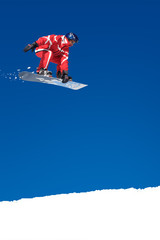 Snowboarder on jump - obrazy, fototapety, plakaty