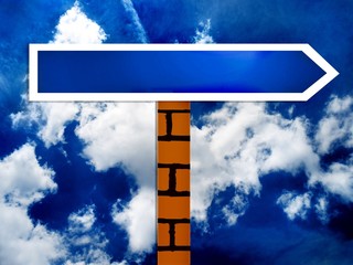 Blank blue direction road street sign and the sky