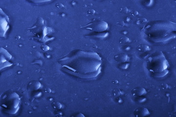 Water drops on a glass surface