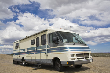 RV under cloudy sky