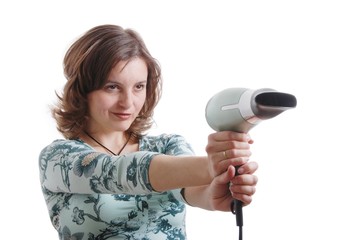 Woman shooting with hairdryer