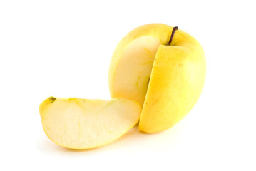Naklejka na ściany i meble Yellow apple with piece cut