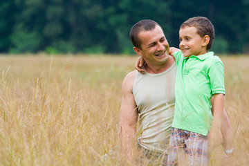 Father and son playing