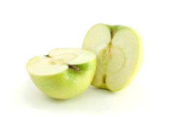 Two green apple halves