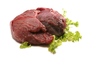 red raw meat over white