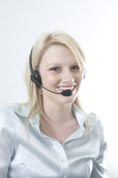 blond woman with headset