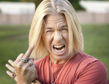 Rock and Roll Guy with his Middle Finger Extended