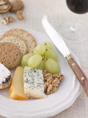 Plate of Cheese and Biscuits with a Glass of Port