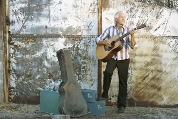 Handsome guitar player