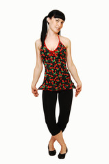 Fototapeta premium Standing woman in sherry dress.