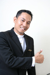 man in hotel or restaurant uniform