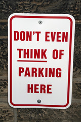 don't even think about parking here warning funny road sign