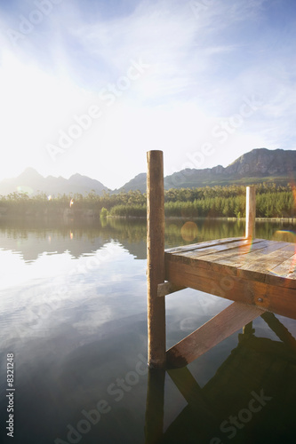 South Africa Jetty Beside Tranquil Lake In Bright Sunlight - 
