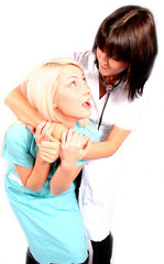Angry Beautiful brunette female doctor fight blonde nurse