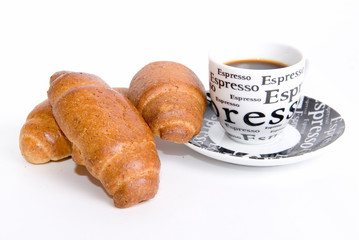 breakfast with black coffe and three croissants