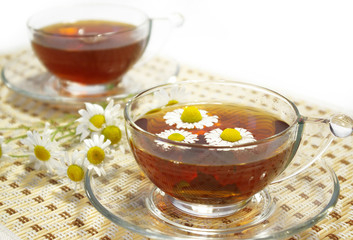 Chamomile blossoms and tea