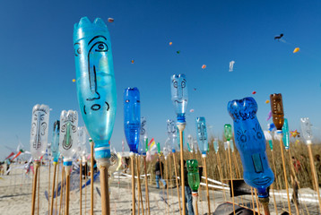 Painted bottles with smiling faces