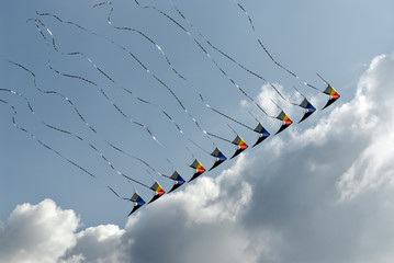 Lined up kites in the sky