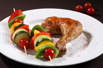 Roasted chicken leg with vegetables