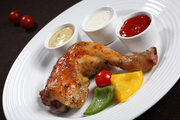 Roasted chicken leg with vegetables