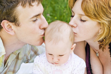Father, mother and baby