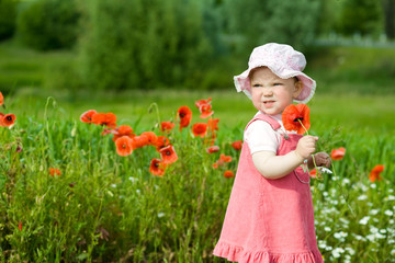 Baby with red flower