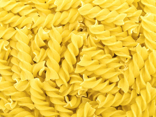 The photo of the yellow pasta background