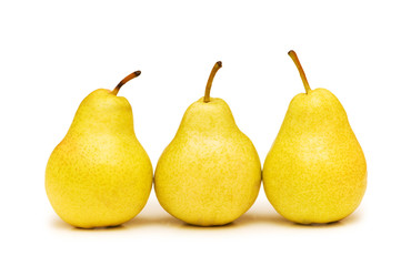 Three yellow pears isolated on the white