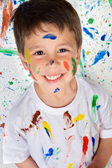 Boy playing with painting
