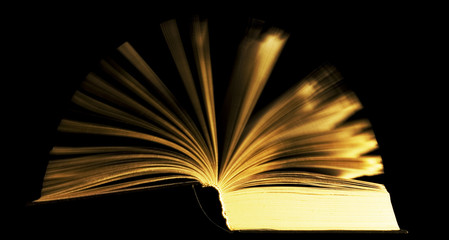book with moving pages isolated on black