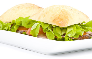 Focaccia  Sandwich with Ham on a White Plate