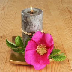 Candle and sinple rose