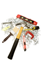 Assorted work tools over white