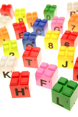 Obraz premium Colorful learning blocks over white