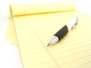 yellow legal pad with pen - 8400283