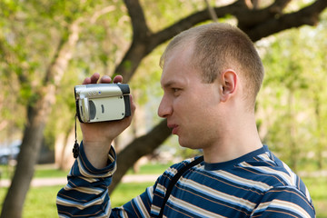 The man with a videocamera.