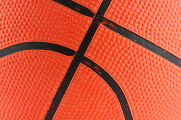 Fototapeta premium Orange rubber basketball macro background