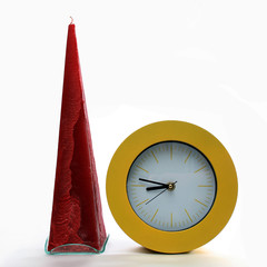 Purple candle and yellow clock