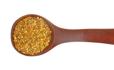 Pollen grains in wooden spoon