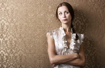 Young Woman Leaning Against a Wall