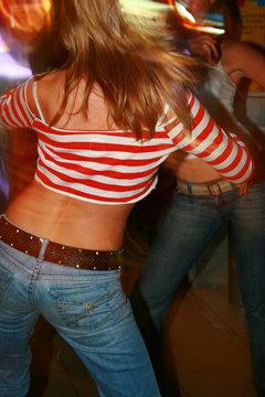 Girls dancing in the nighclub