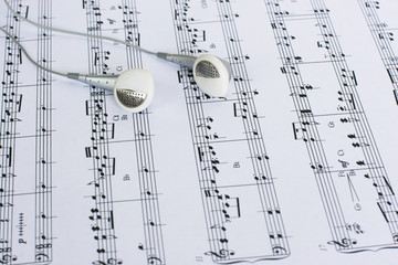 Fototapeta premium Headphones on Sheet Music