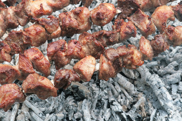 Barbecue grill meat in cooking process.