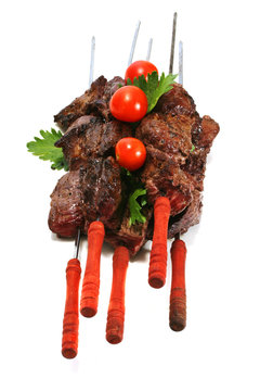 grilled meat on skewer with tomatoes
