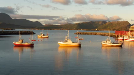 three fishing boats in Eggum at  midnight
