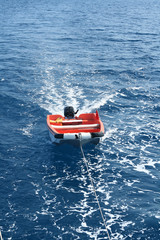 Fototapeta premium Boat is towing to harbour.