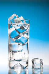 Tall iced drink backlit with cool blue gradient lighting
