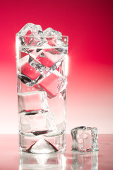 Tall iced drink with crimson gradient lighting